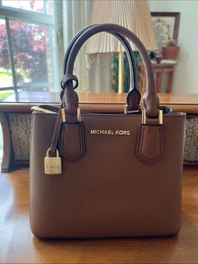 Michael Kors Brown Pebbled Leather small handbag with Gold Hardware